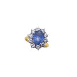 An 18ct gold sapphire and diamond cluster ring,