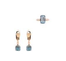 An aquamarine ring together with a pair of ear pendants,