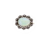 A Victorian opal and diamond brooch,