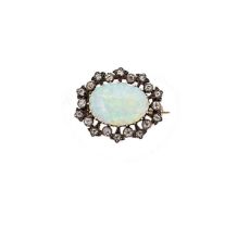 A Victorian opal and diamond brooch,