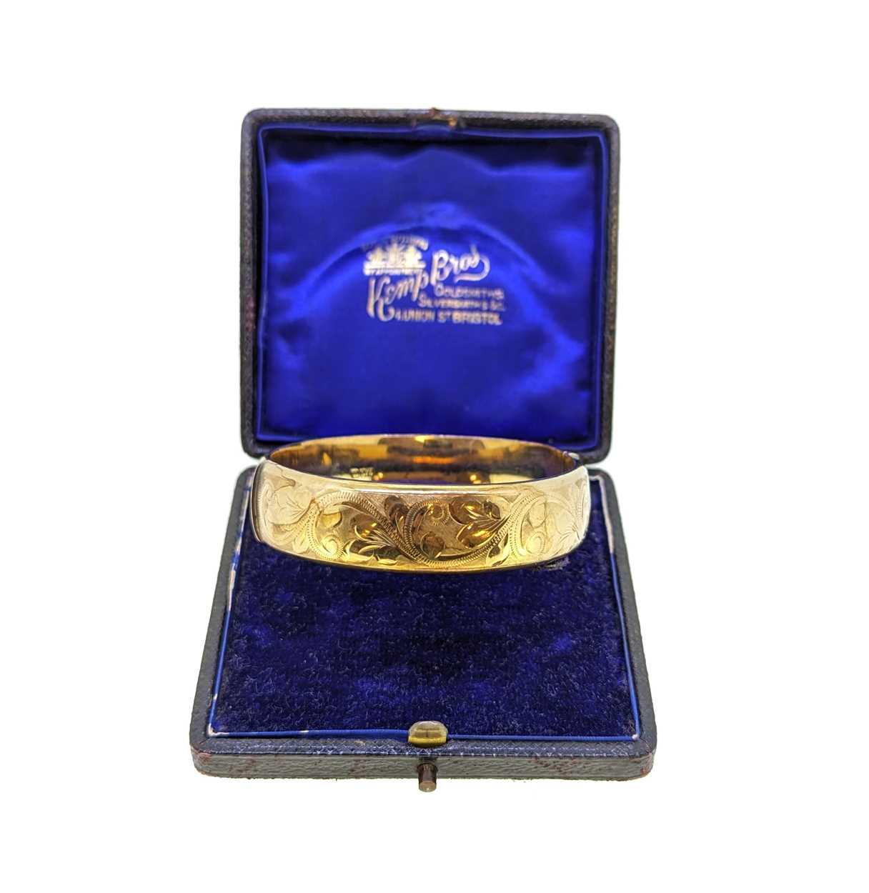 A late 20th century 9ct gold half engraved bangle, - Image 3 of 3