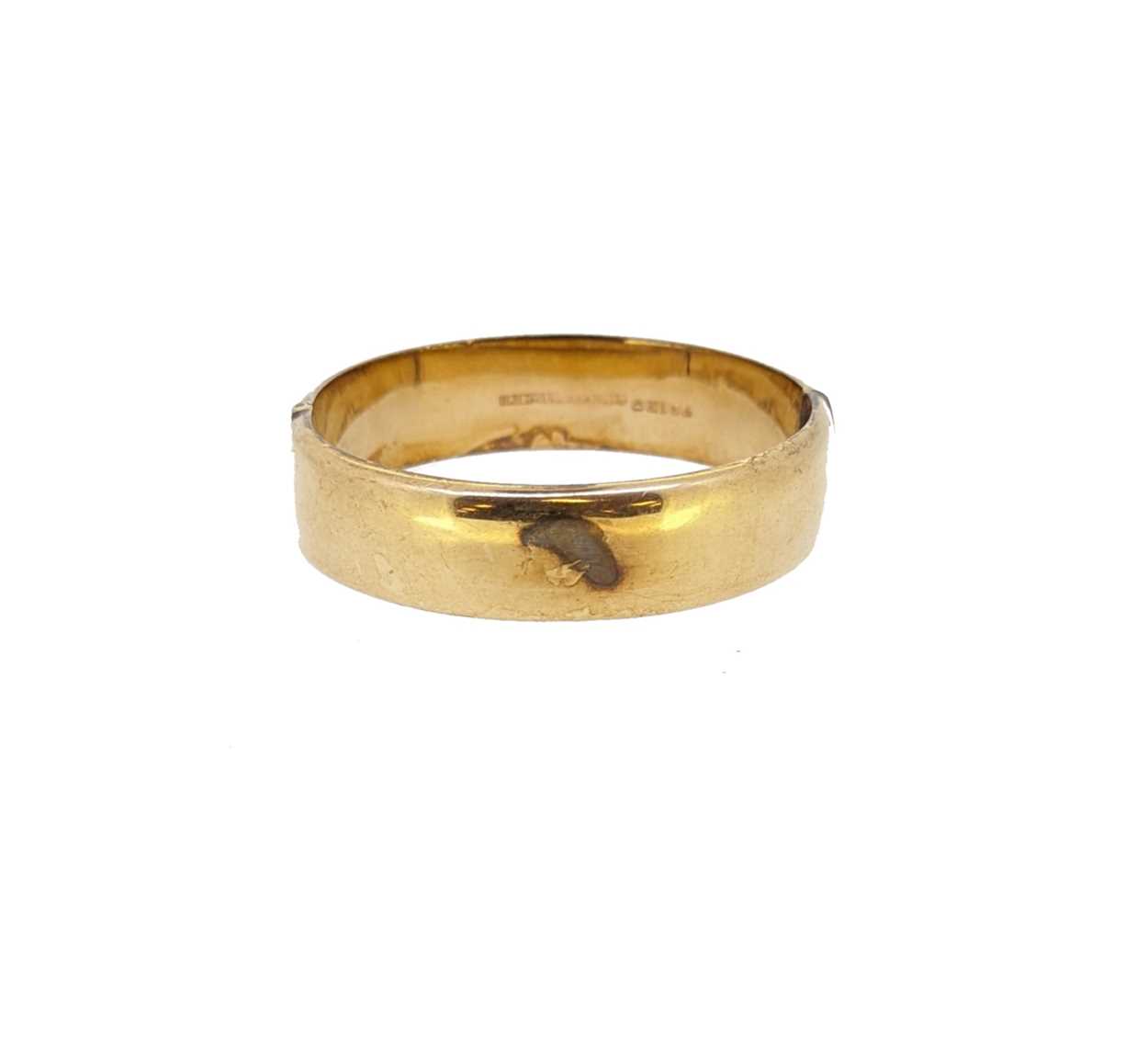 A late 20th century 9ct gold half engraved bangle, - Image 2 of 3