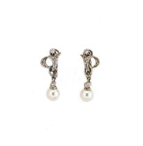A pair of pearl and diamond ear pendants,