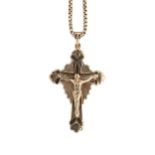 A 9ct gold crucifix pendant and chain,