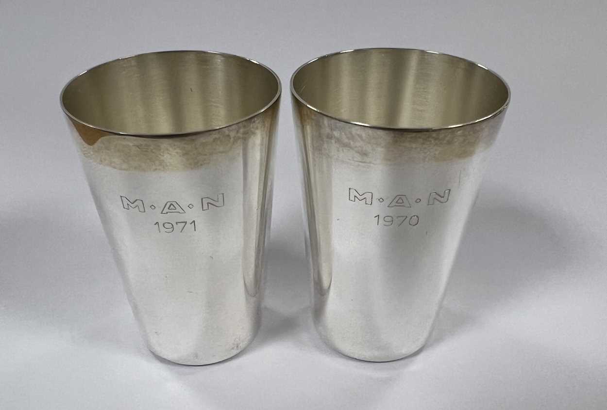 A set of six German metalwares silver stacking shot cups together with a further two pairs, - Image 6 of 7