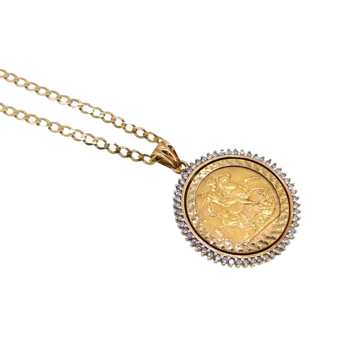 A diamond set full sovereign pendant and chain,