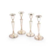 A set of 4 Elizabeth II silver candlesticks,