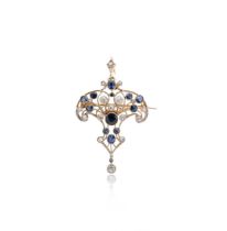 An Art Nouveau sapphire and diamond pendant/brooch,