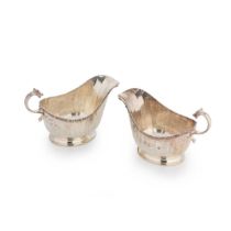 A pair of George VI silver sauce boats,