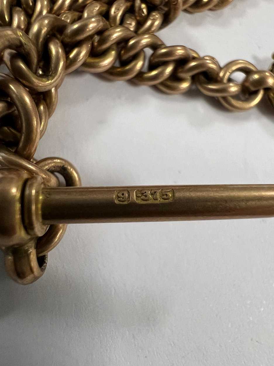 An early 20th century 9ct gold 'Albert' watch chain with attachment, - Image 6 of 9