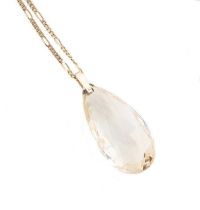 A citrine pendant and chain,