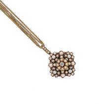 A split pearl and diamond pendant and chain,