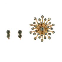 A green sapphire pendant/brooch, together with a pair of ear studs,