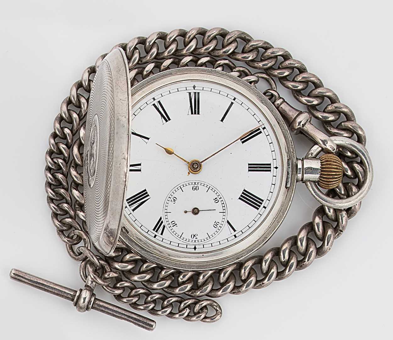 Unsigned - A Swiss silver hunter pocket watch with earlier watch chain,