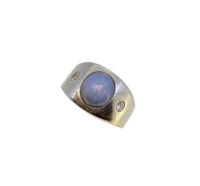 A star sapphire and diamond ring,