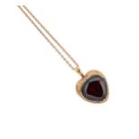 A garnet memorial pendant and chain,