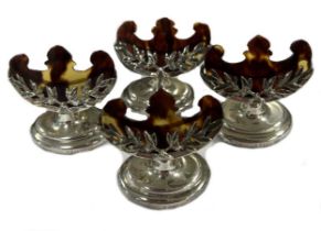 Four early 20th century silver and tortoiseshell menu holders,