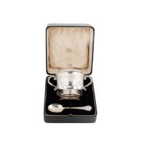 A George V silver porringer, cover and spoon,