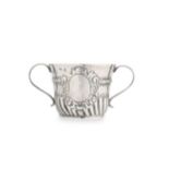 A Queen Anne Britannia silver porringer,