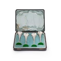 A set of four Edward VII silver spill vases in a fitted case,