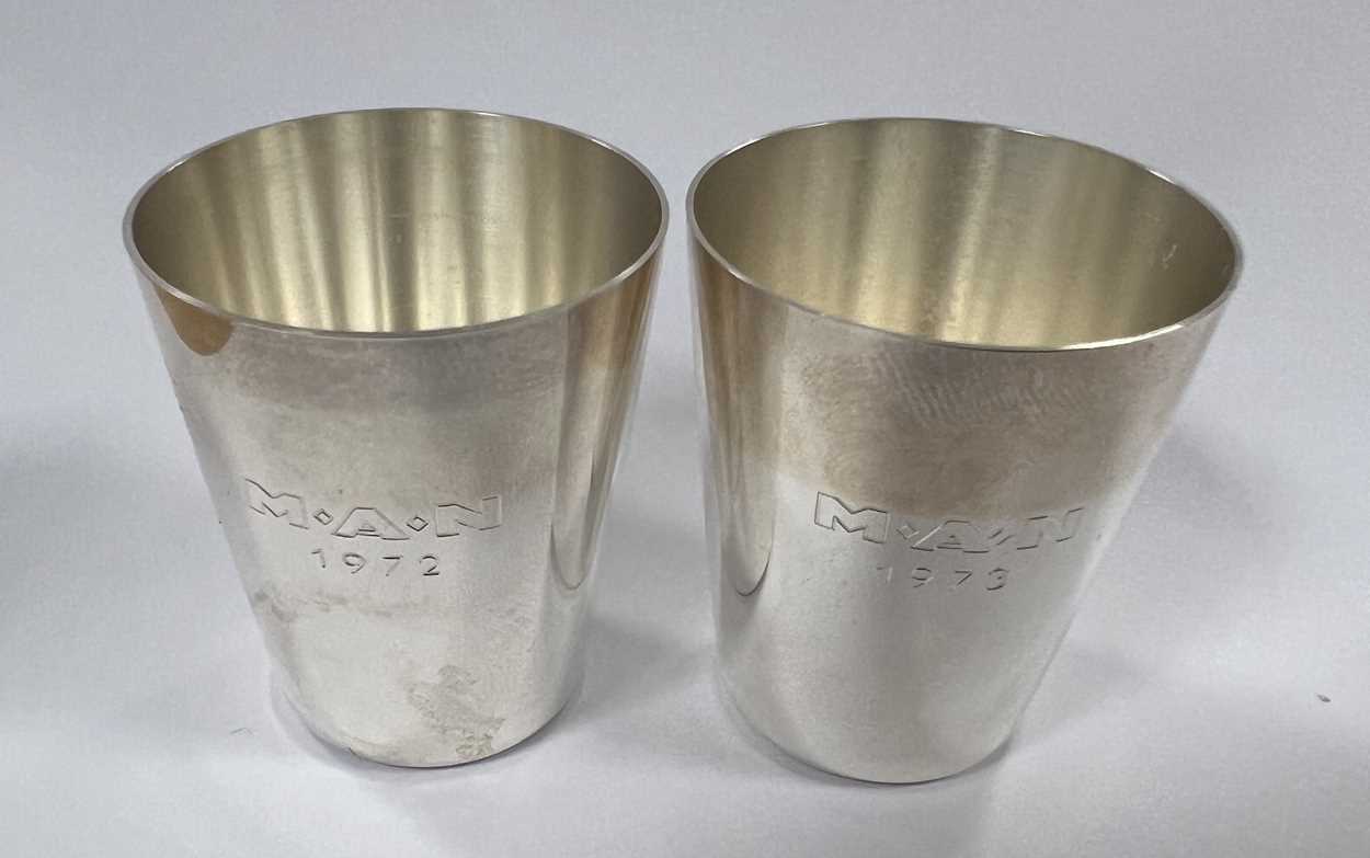 A set of six German metalwares silver stacking shot cups together with a further two pairs, - Image 2 of 7