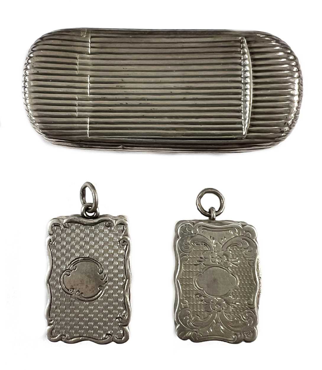 A 19th century silver snuff box, mark of Joseph Willmore, together with two vinaigrettes,