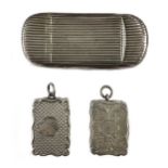 A 19th century silver snuff box, mark of Joseph Willmore, together with two vinaigrettes,