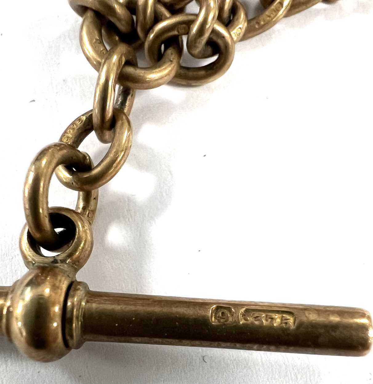 An early 20th century 9ct gold 'Albert' watch chain, - Image 4 of 7