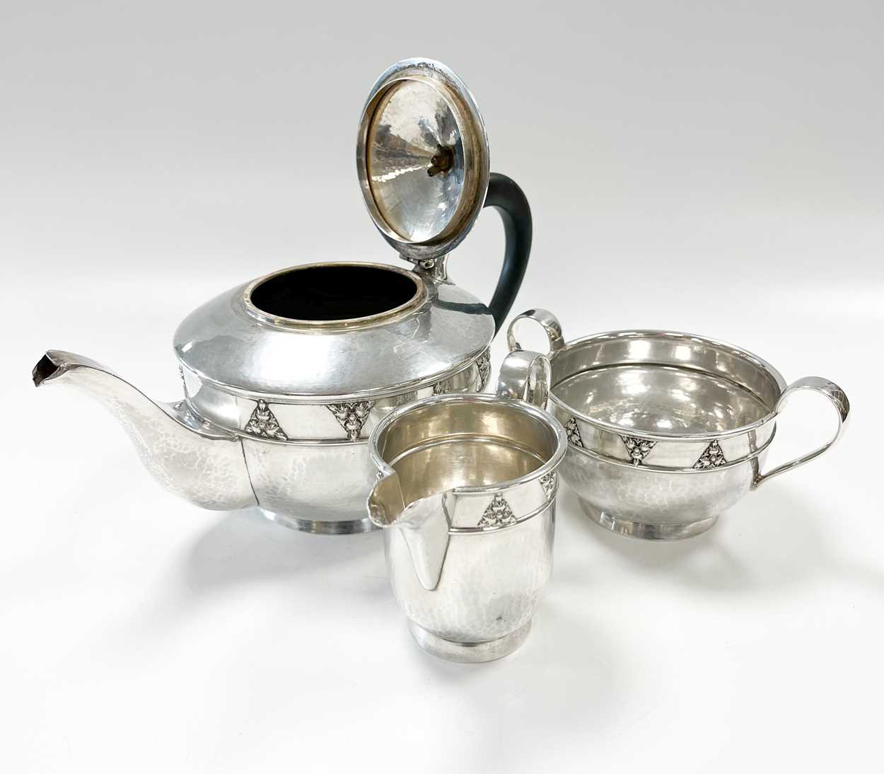 A George V silver Arts & Crafts style 3-piece tea set, - Image 2 of 7