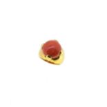 A coral dress ring,