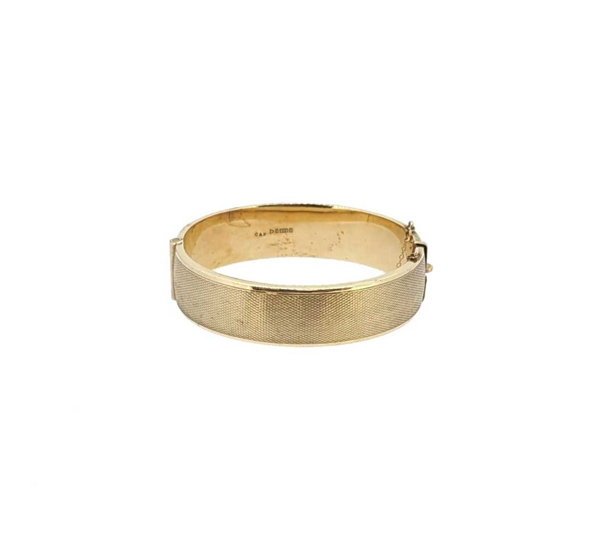 Cropp and Farr - A late 20th century 9ct gold hinged bangle, - Image 2 of 2