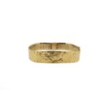 A late 20th century 9ct gold bracelet,