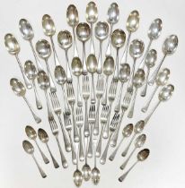 A 36-piece harlequin set of early 20th century silver flatware with 14 additions,