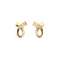 A pair of 18ct gold diamond set ear studs,