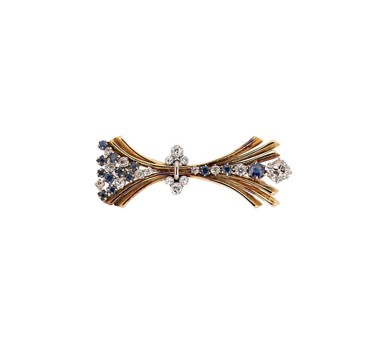 An 18ct gold diamond and sapphire brooch,
