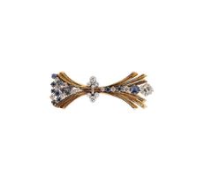 An 18ct gold diamond and sapphire brooch,