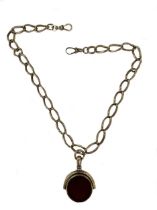 A watch chain with attached fob,