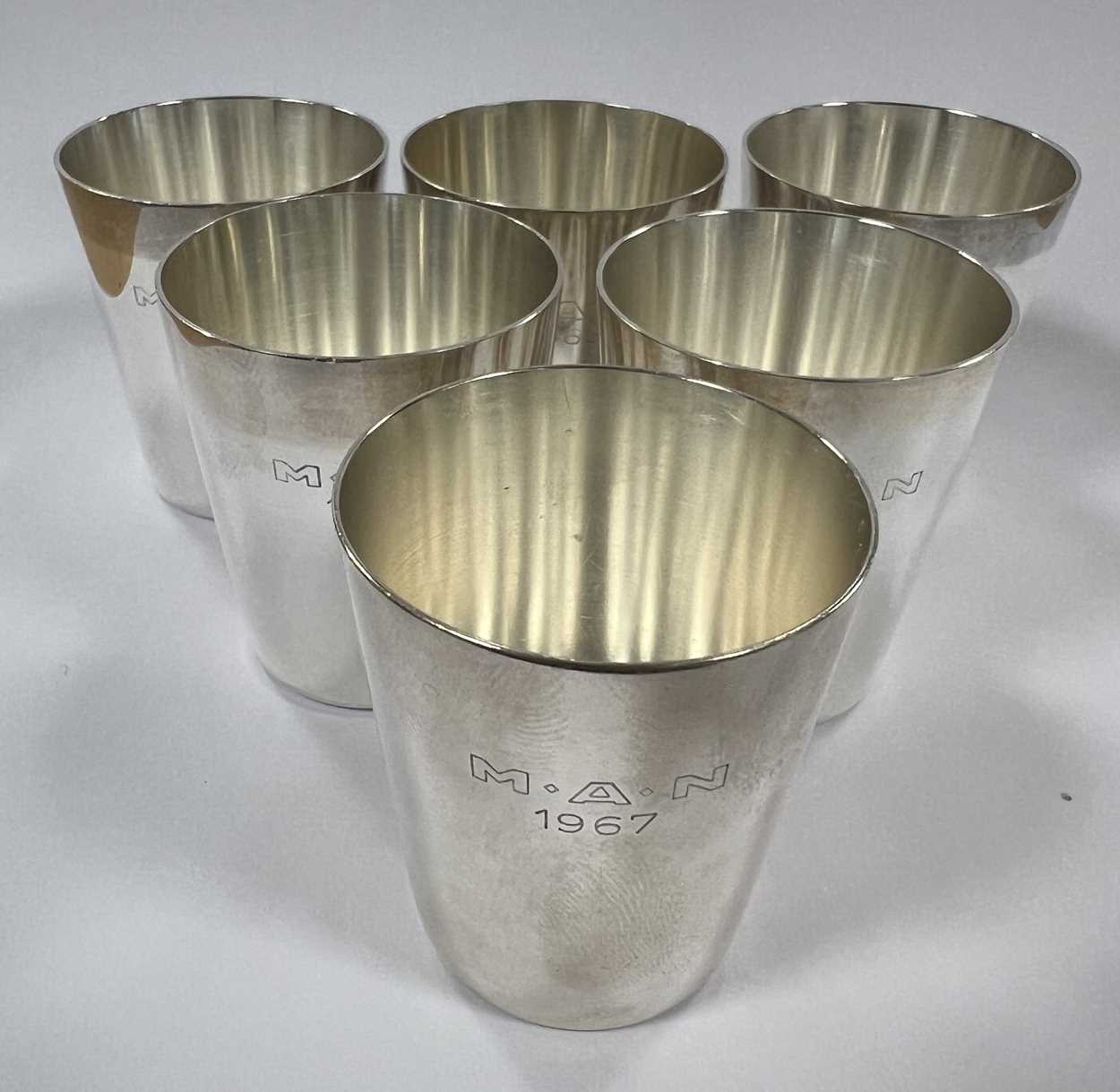 A set of six German metalwares silver stacking shot cups together with a further two pairs, - Image 4 of 7