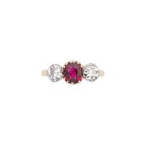 An 18ct gold Burmese ruby and diamond three stone ring,