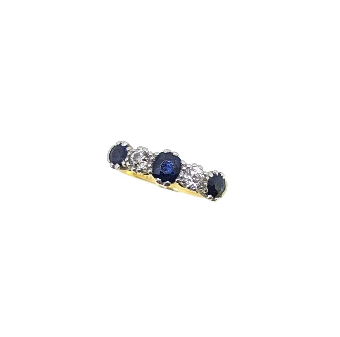 A five stone sapphire and diamond ring,