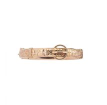 An early 20th century 9ct gold buckle style bangle,