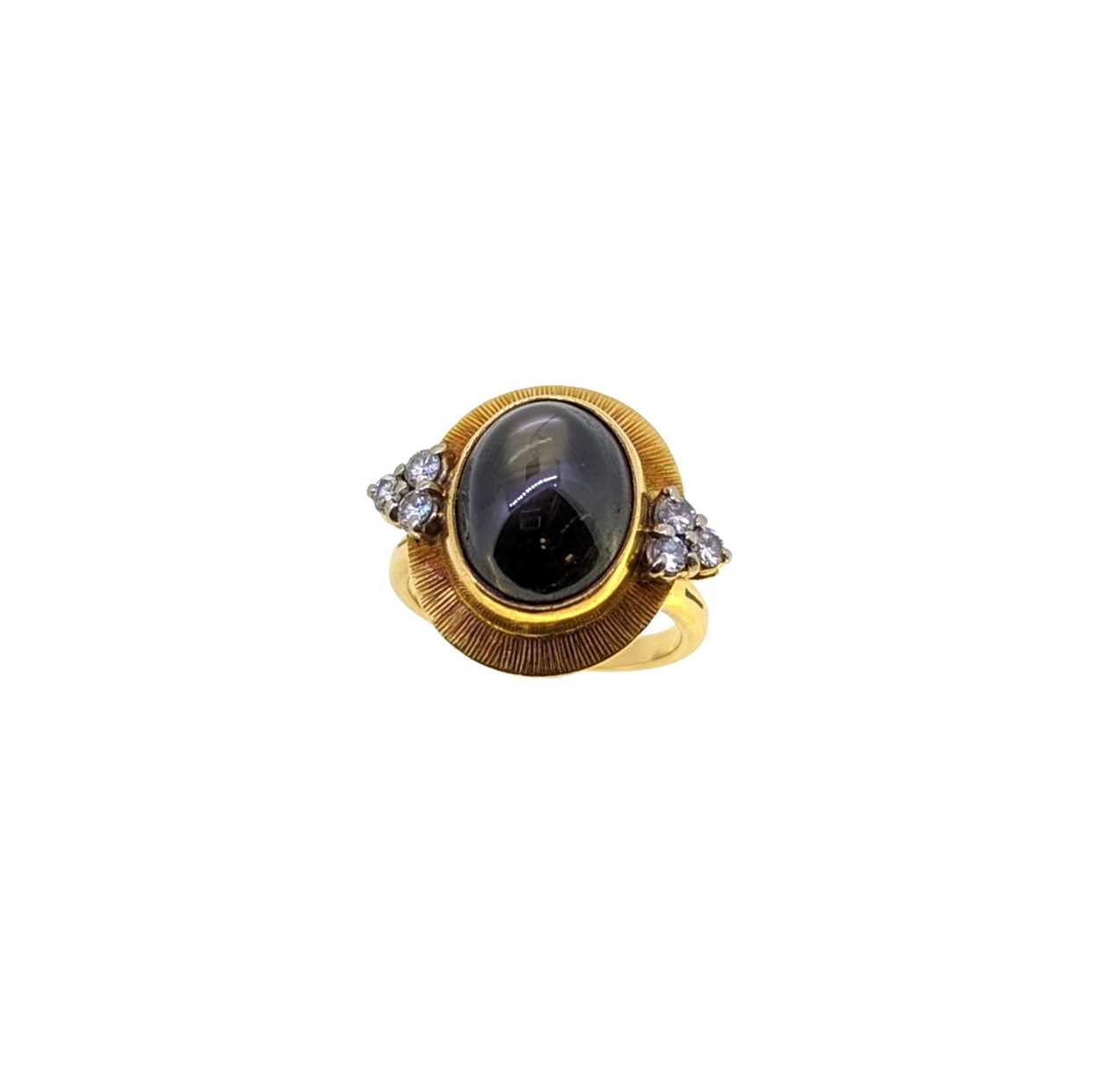 A late 20th century 18ct gold star sapphire and diamond ring,
