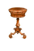 A Victorian walnut work table,