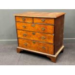 An 18th century oak and walnut chest of drawers, on bracket feet, 91 x 99 x 55cm