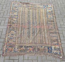 A Caucasian rug, with striped field, 180 x 150cm approx. The rug has large areas of wear in the