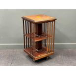 An Edwardian inlaid mahogany revolving bookcase 85 x 46 x 46cm