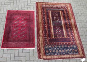 A Turkman rug 213 x 141cm together with a small Bokhara rug 136 x 92cm