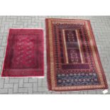 A Turkman rug 213 x 141cm together with a small Bokhara rug 136 x 92cm