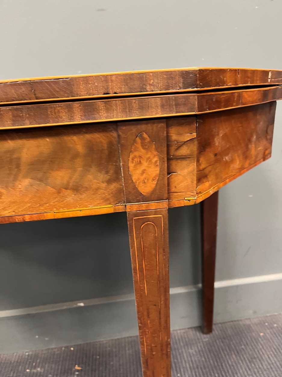 A George III line inlaid mahogany card table with canted rectangular top on tapered legs 73 x 92 x - Image 2 of 6