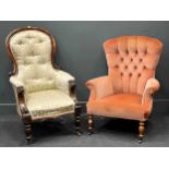 A Victorian spoon back armchair together with another button back armchair upholstered in pink